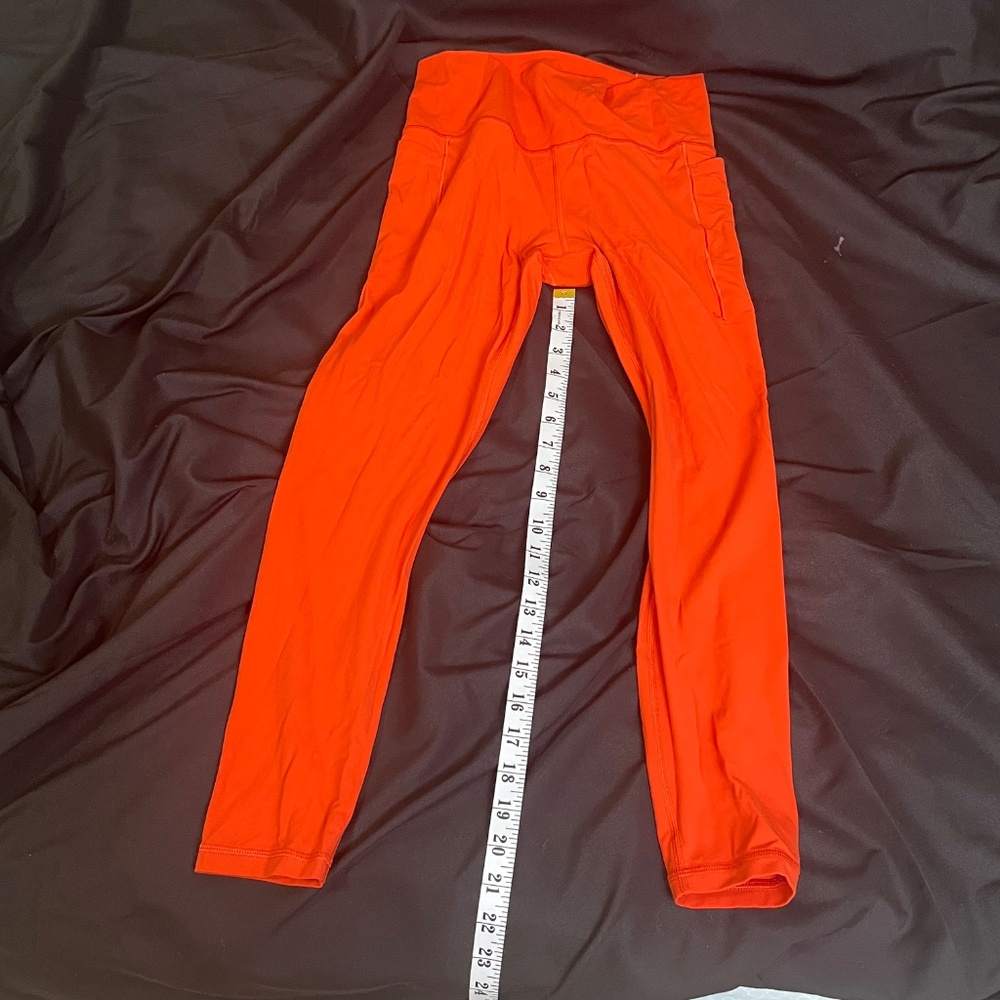 NWT ATHLETA TRANSCEND STASH TIGHT LEGGINGS Size Large